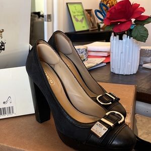 Coach Tinsley Platform shoes size 5 - $25
(Have matching coach purse)